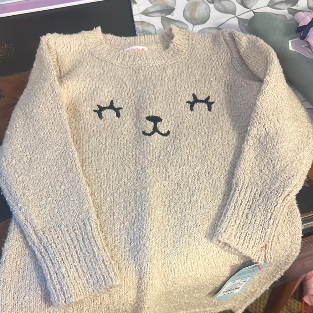 Cozy Beige Sweater with Cute Face Design